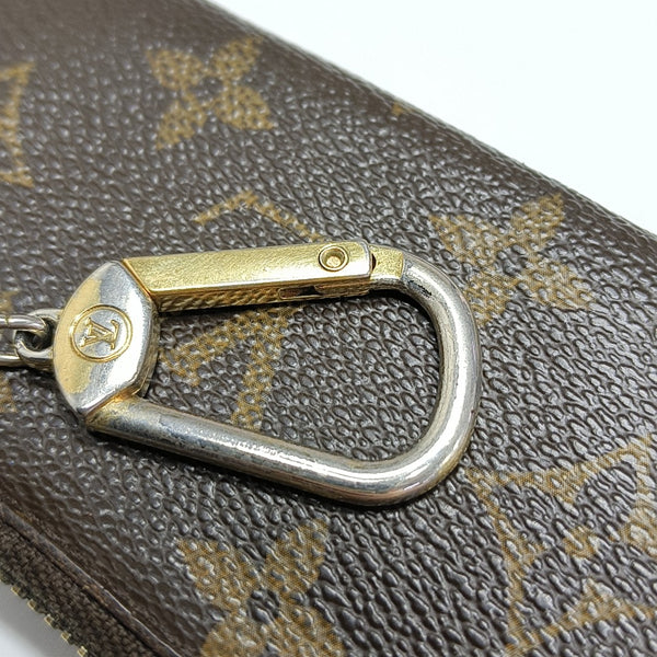Monogram Coated Canvas Clutch Brown