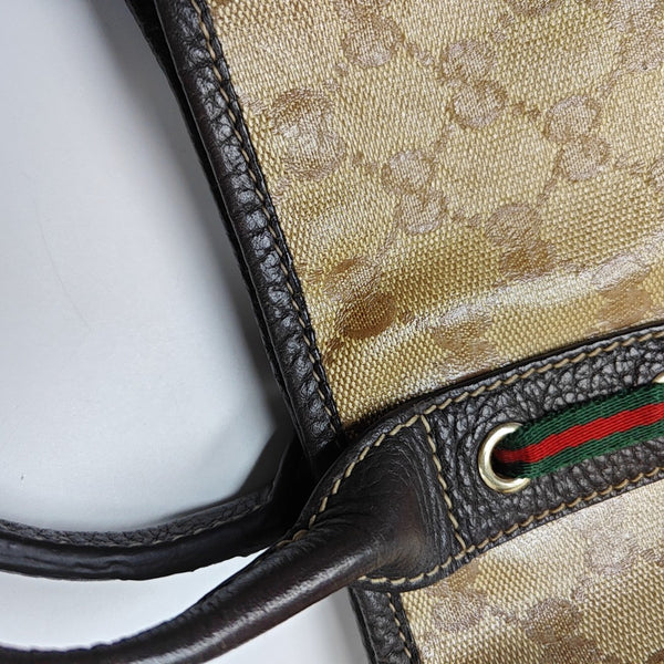 Princy Monogram Coated Canvas Brown