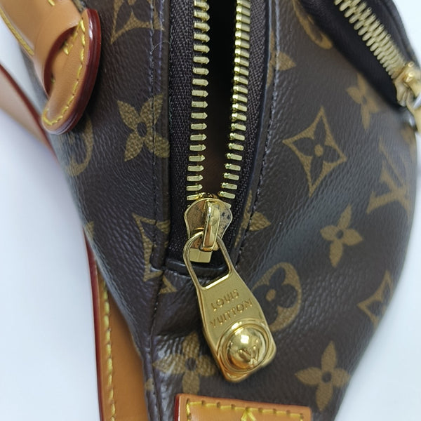 RUSH Monogram Coated Canvas Brown