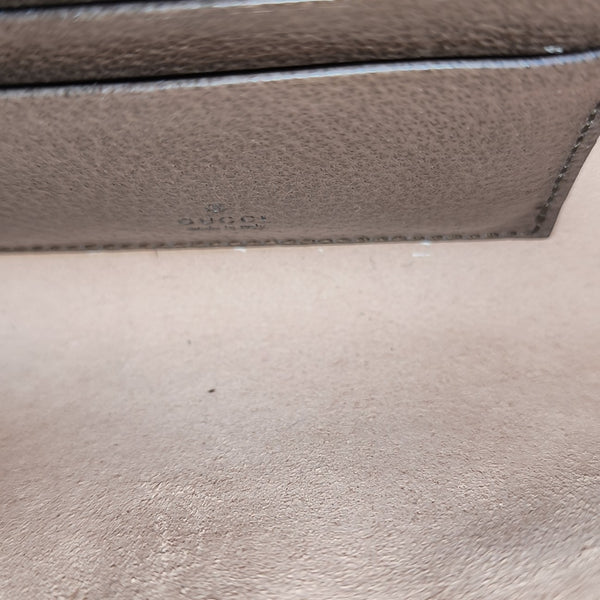 Rajah Mini Monogram Coated Canvas Beige