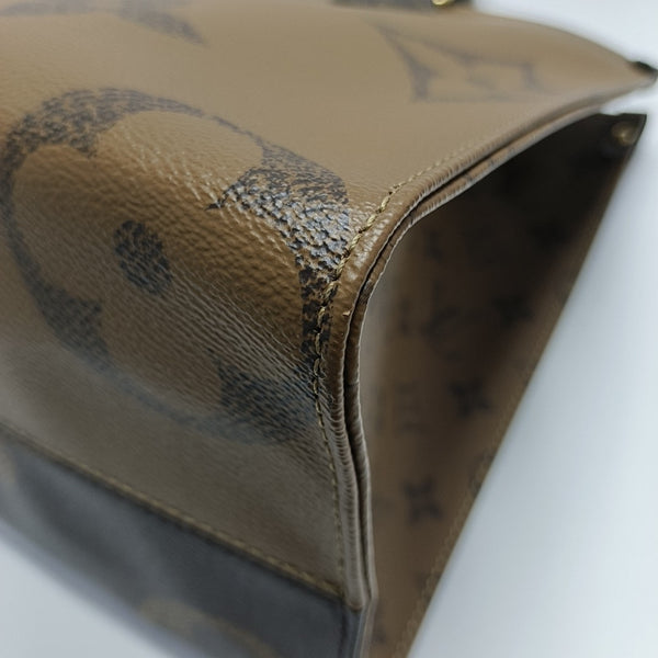 ONTHEGO MM Monogram Coated Canvas Brown