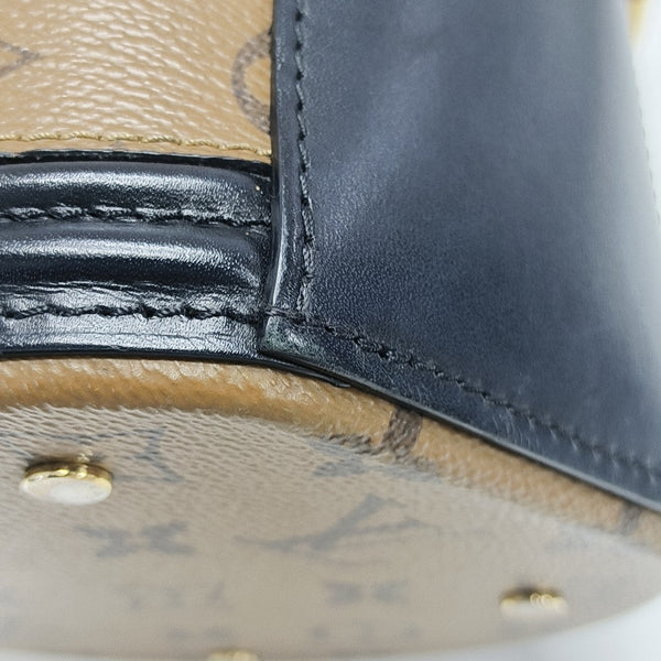CANNES PM Monogram Coated Canvas Brown