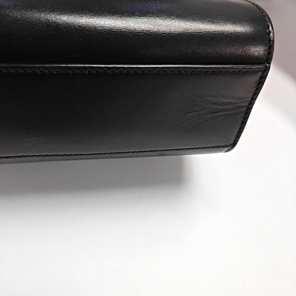 Authenticated pre-owned MANHATTAN Calfskin Black - Top Handle Bag at Looply