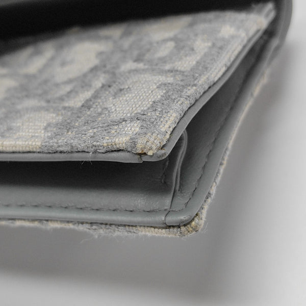 Authenticated pre-owned Saddle Oblique Fabric Gray Card Holder - Card Holder at Looply