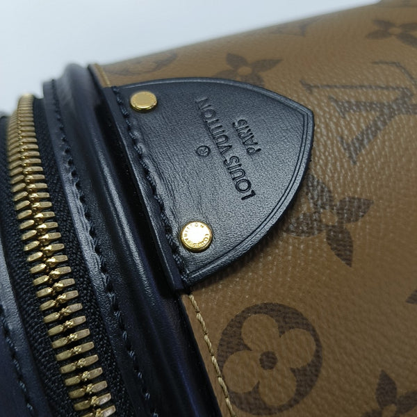 CANNES PM Monogram Coated Canvas Brown