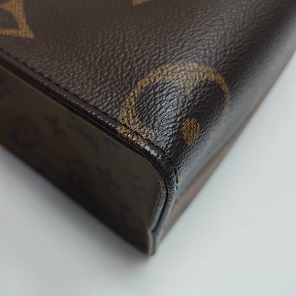 ONTHEGO PM Monogram Coated Canvas Brown