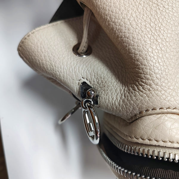 Authenticated pre-owned Mon Tresor Calfskin Beige - Bucket Bag at Looply