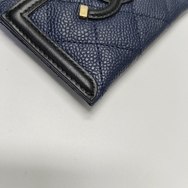 Authenticated pre-owned FILIGREE Quilted Grained Calfskin Blue Card Holder - Card Holder at Looply
