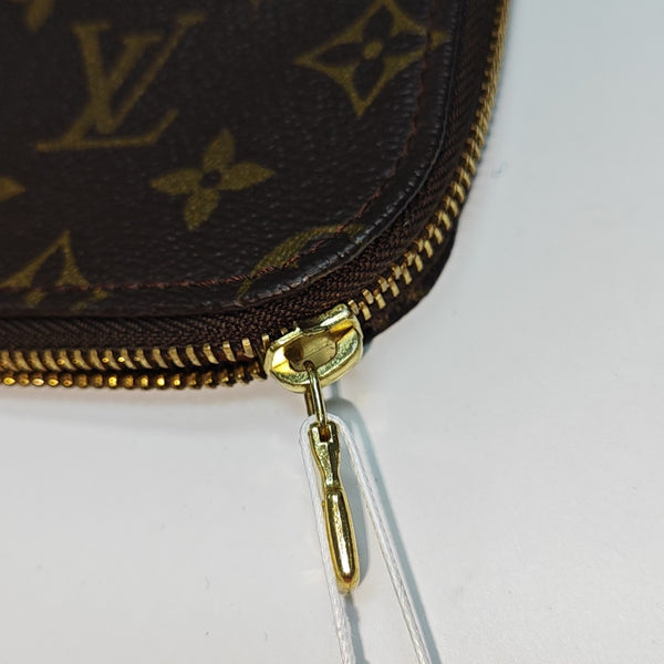Monogram Coated Canvas Clutch Brown