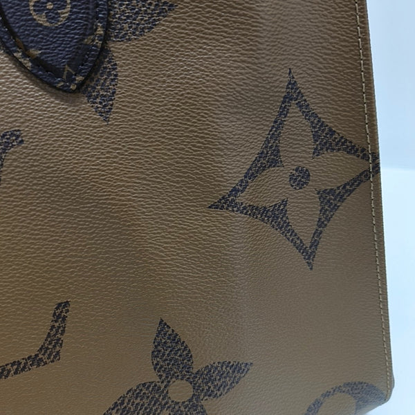 ONTHEGO MM Monogram Coated Canvas Brown