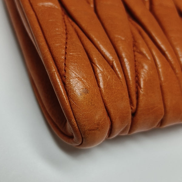 Quilted Lambskin Clutch Orange