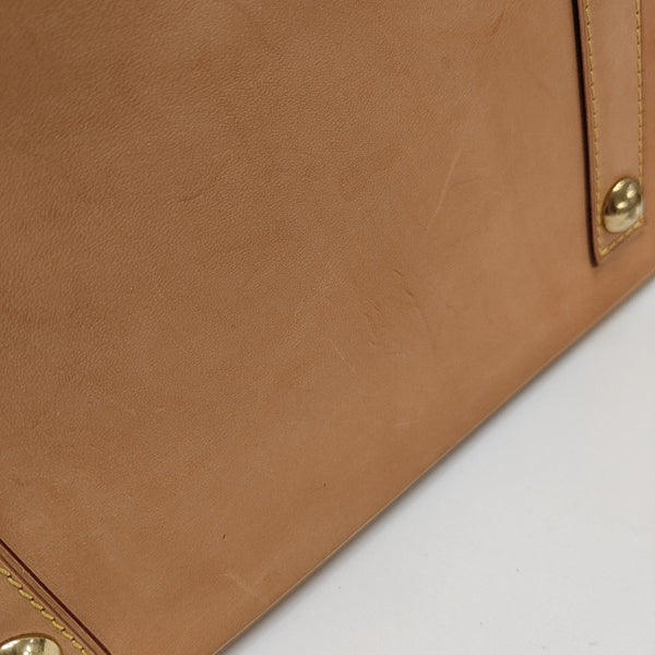 ALMA PM Monogram Coated Canvas Brown