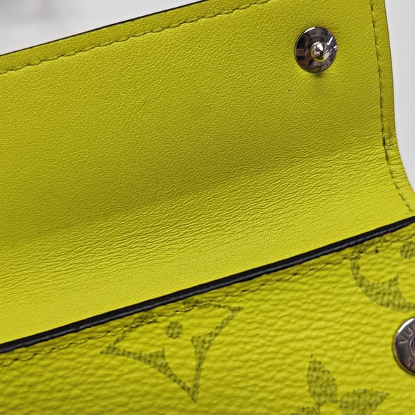 DISCOVERY Monogram Coated Canvas Yellow Card Holder