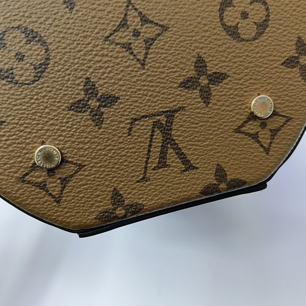 CANNES PM Monogram Coated Canvas Brown