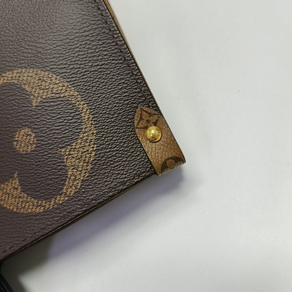 ONTHEGO GM Monogram Coated Canvas Brown