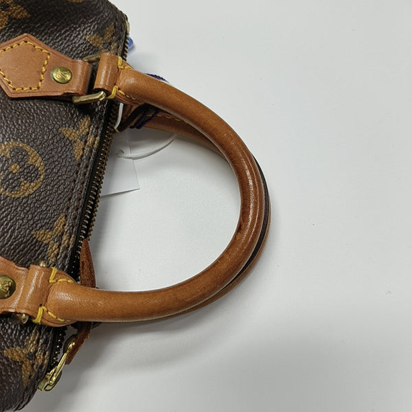 SPEEDY Monogram Coated Canvas Brown