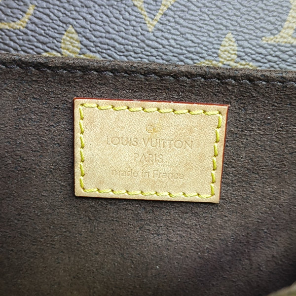 MÉTIS EAST WEST Monogram Coated Canvas Brown