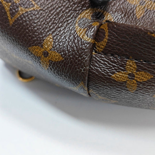 Authenticated pre-owned PALM SPRINGS Mini Monogram Coated Canvas Brown - Backpack at Looply