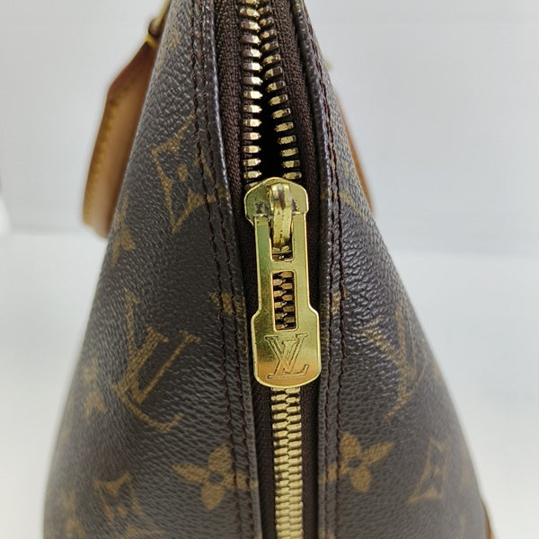 ALMA PM Monogram Coated Canvas Brown