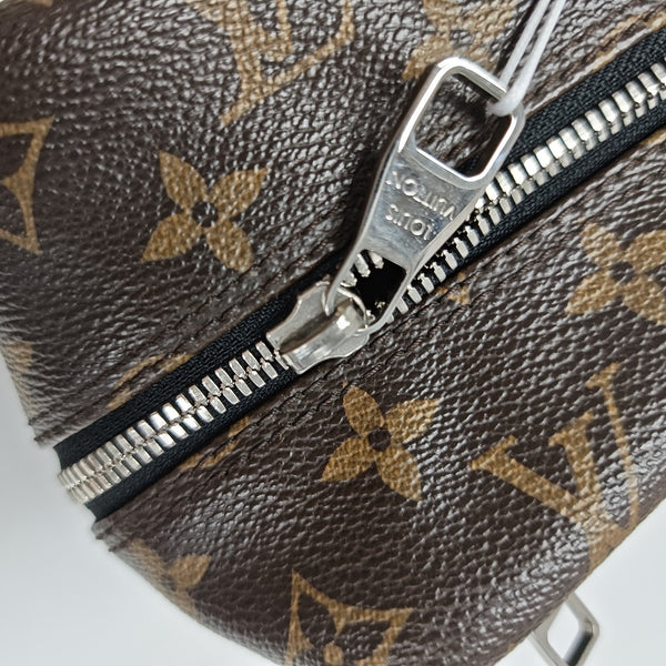 Monogram Coated Canvas Clutch Brown