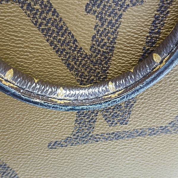 ONTHEGO MM Monogram Coated Canvas Brown