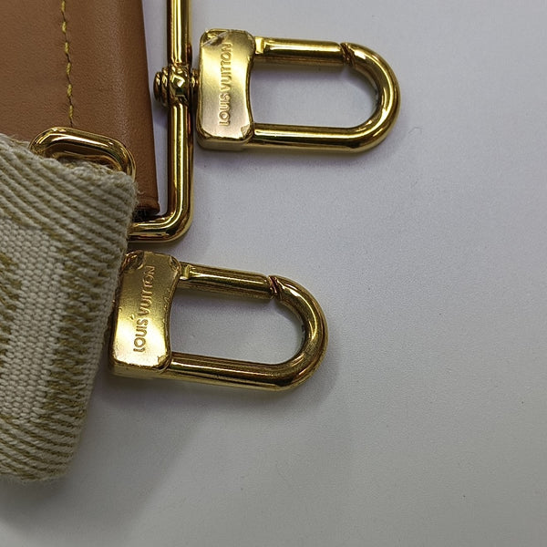 UTILITY Monogram Coated Canvas Brown