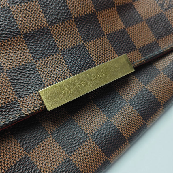 FAVORITE PM Damier Ebene Coated Canvas Brown