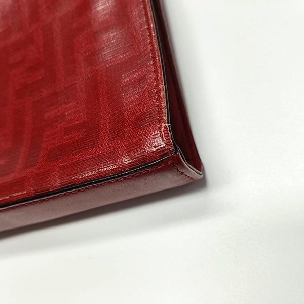 Authenticated pre-owned Runaway Coated Canvas Red - Clutch at Looply