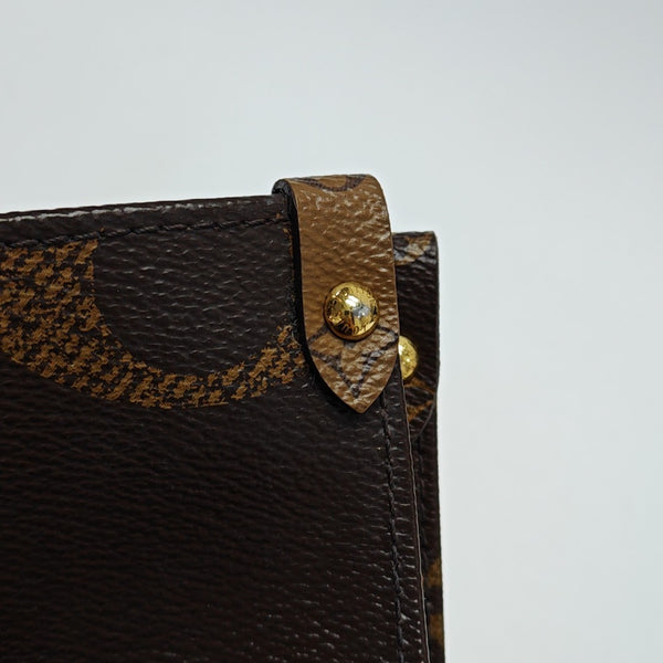 ONTHEGO MM Monogram Coated Canvas Brown