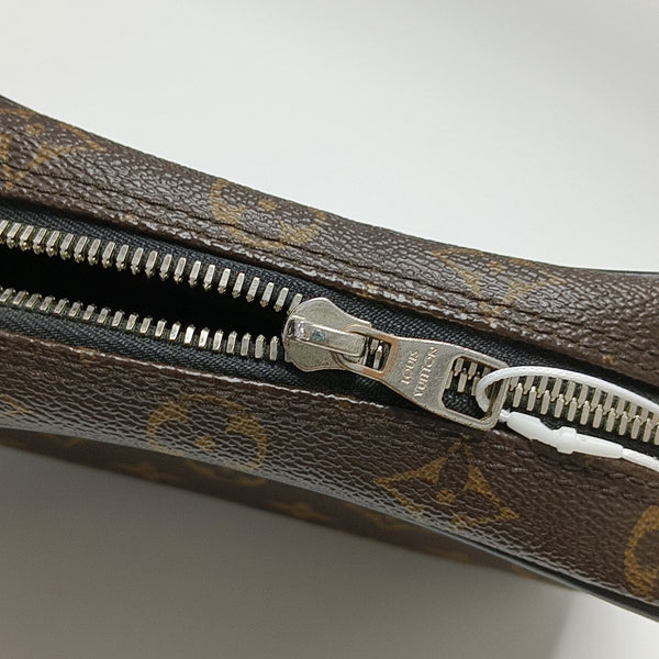 Monogram Coated Canvas Clutch PM Brown