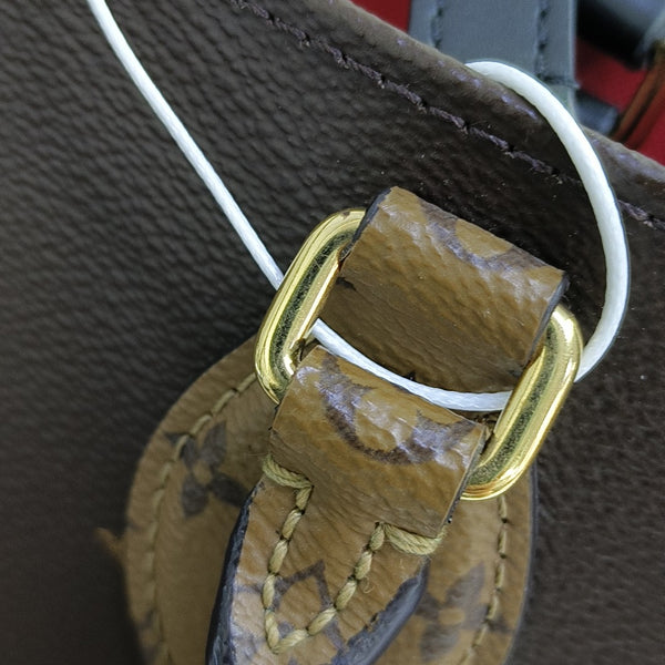 ONTHEGO MM Monogram Coated Canvas Brown