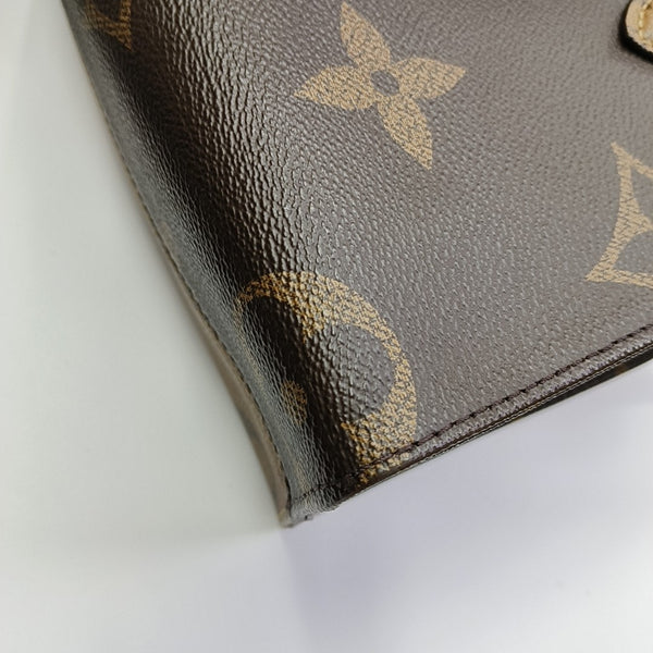 ONTHEGO PM Monogram Coated Canvas Brown