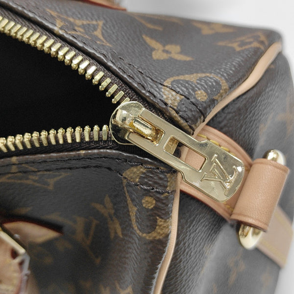 SPEEDY 25 Monogram Coated Canvas Brown