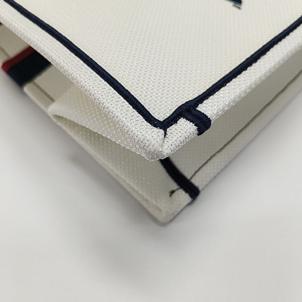 Authenticated pre-owned Book Tote Large Canvas White - Tote Bag at Looply
