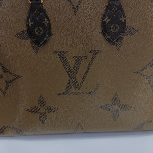 ONTHEGO MM Monogram Coated Canvas Brown