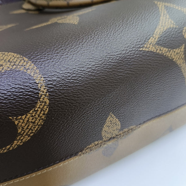 ONTHEGO MM Monogram Coated Canvas Brown