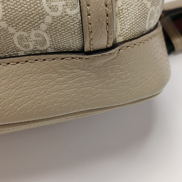 Monogram Coated Canvas Backpack Beige