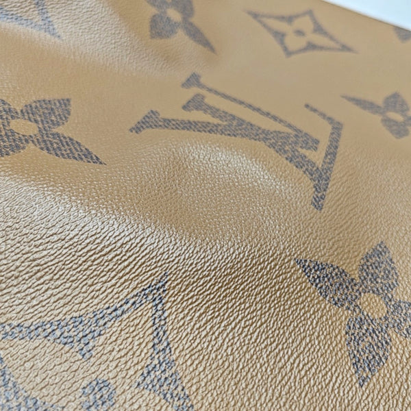 ONTHEGO GM Monogram Coated Canvas Brown