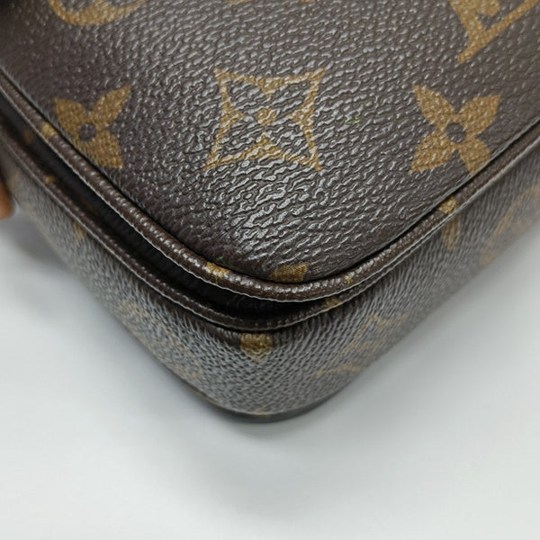 MÉTIS EAST WEST Monogram Coated Canvas Brown