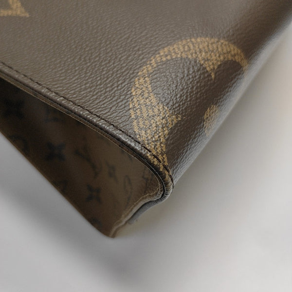 ONTHEGO MM Monogram Coated Canvas Brown