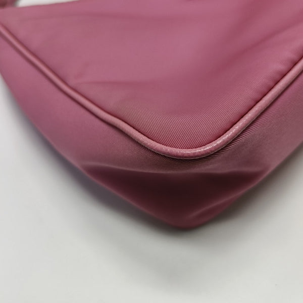 Authenticated pre-owned Re-Edition2005 Mini Nylon Pink - Top Handle Bag at Looply