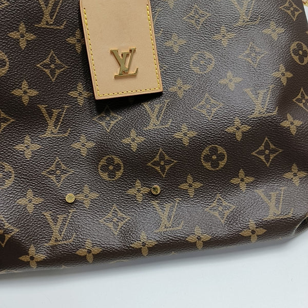 ATLANTIS Monogram Coated Canvas Brown