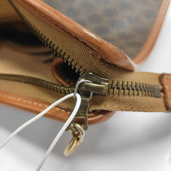Authenticated pre-owned MACADAM CLUTCHE Coated Canvas Brown - Clutch at Looply