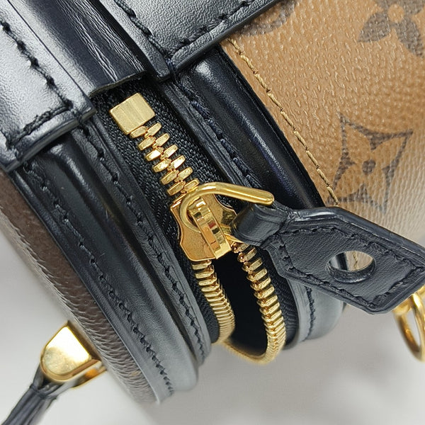 CANNES PM Monogram Coated Canvas Brown