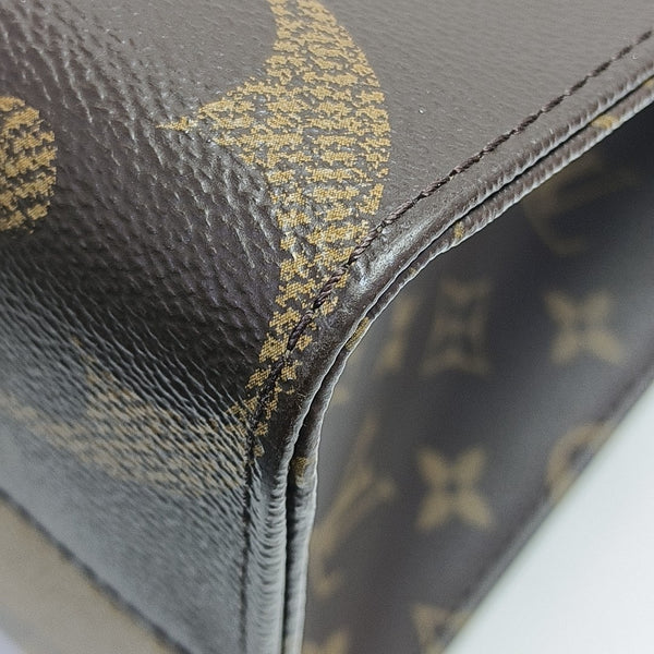 ONTHEGO MM Monogram Coated Canvas Brown