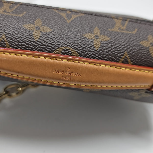 MÉTIS EAST WEST Monogram Coated Canvas Brown