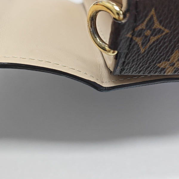 TRUNK Monogram Coated Canvas Brown
