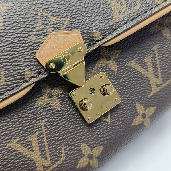 Pochette Camille Monogram Coated Canvas Brown