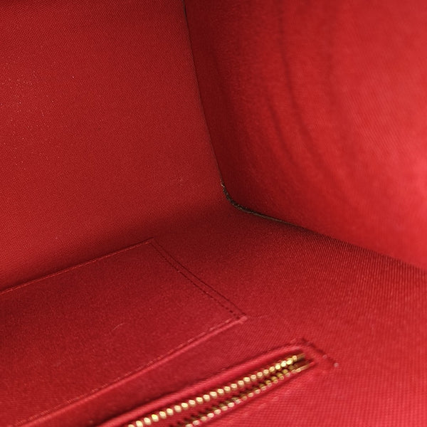 ONTHEGO MM Monogram Coated Canvas Brown