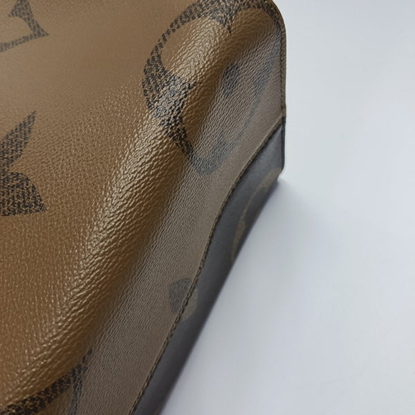 ONTHEGO MM Monogram Coated Canvas Brown